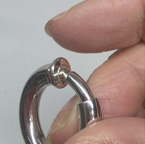 Silver toned puffy hoop huggie clip on retractable comfort Earrings - Picture 4 of 11